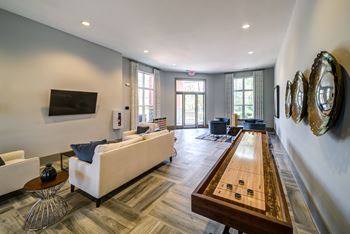 A Shiny Wooden Table at The Aster Apartments, Cary, North Carolina